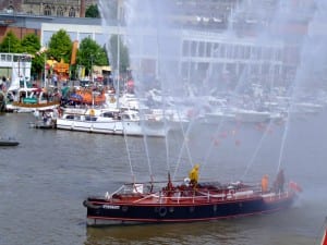 Working exhibits - Photograph of the fireboat Pyronaut spraying water