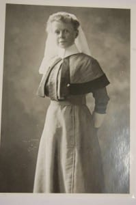 Black and white photograph of a nurse