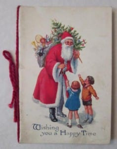 image of a christmas card with an illustration of santa and two children