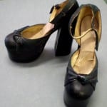 photograph of a pair of black platform shoes from the 1970s