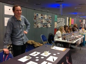 Photo of a man at the Bristol Museums stand at the UWE volunteer fair
