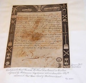 Photo of a memento mori with inscriptions and drawings on it