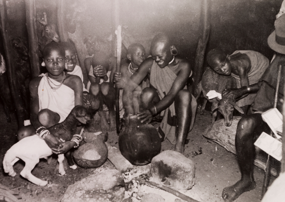 Image of a group from the Kikuyu tribe cooking a meal