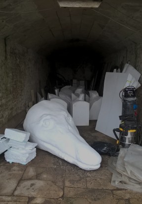An image of the different Pliosaur parts in a tunnel waiting to be put together. 