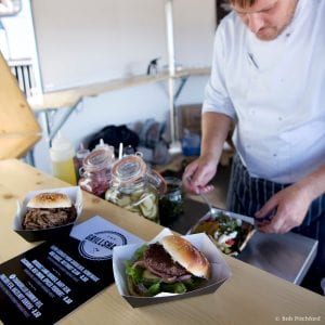 The Head chef at M Shed preparing mouth-watering burgers in the new Grillshack