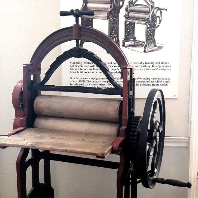 Photo of a wringer on display at blaise castle house museum