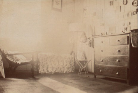 An archive photo of Margaret’s room in the PO Bungalow, with the home made covers for boxes clearly visible
