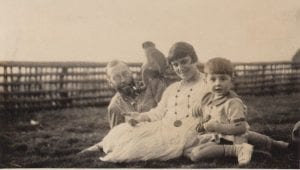 The Trotter family with Marmaduke, their pet monkey, August 1926