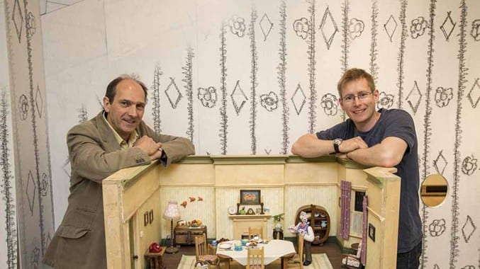 Photo of David Sproxton and Merlin Crossingham with a Wallace & Gromit set