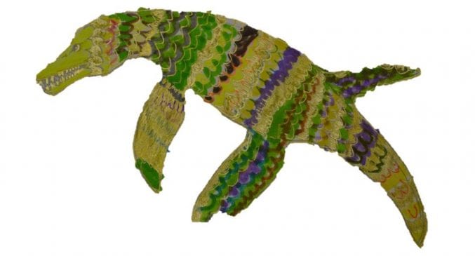 Pliosaurus design by Emily- Jane. It has green, purple and brown scales.