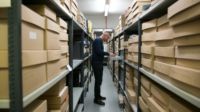 Phil Owen working behind the scenes at Bristol Archives. (Photograph courtesy of Lisa Whiting)