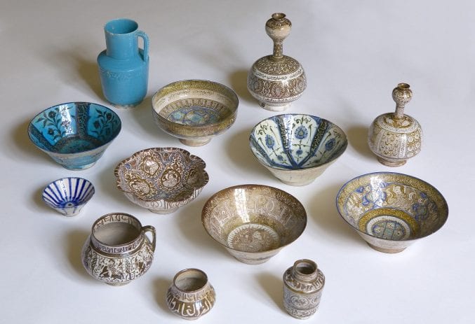 13 pieces of pottery including patterned jugs and dishes
