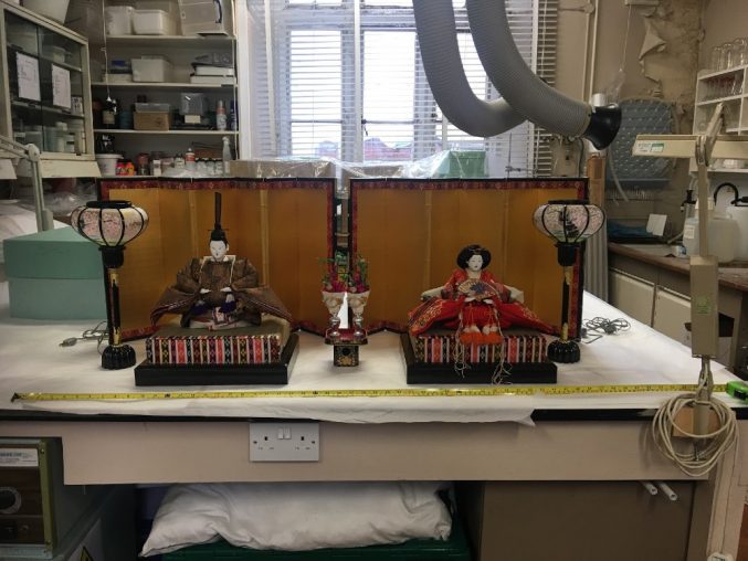 Unboxing the Emperor and Empress hinamatsuri dolls from Rosemary Bailey’s 1950s set in the Conservation Studio