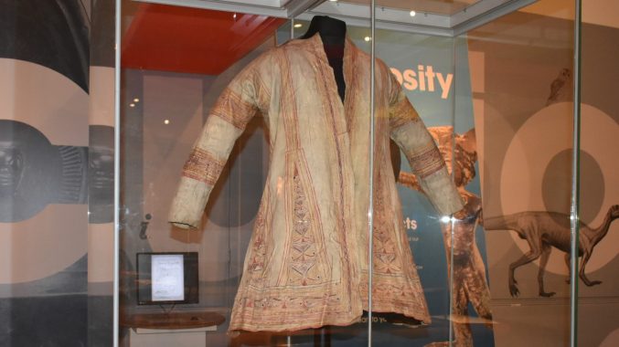 A coat made of Caribou hide on display in a museum