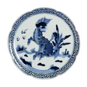 Blue Porcelain plate painted with a kirin in the middle. 