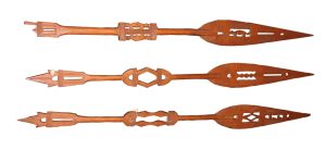 Three Nigerian wooden paddles made by the Itsekiri people of Southern Nigeria.