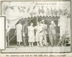 European guests entering the Cocktail Bar at the Kenya RBL fete, c.1932 (from BECC 2003/212/1/5)