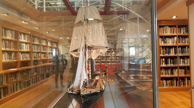 A replica of the SS Great Britain on display inside a glass case