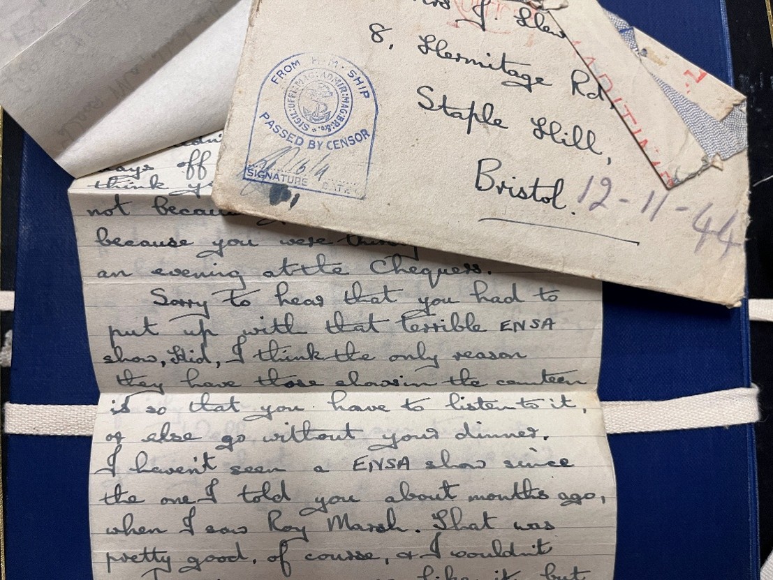 A letter on a blue surface